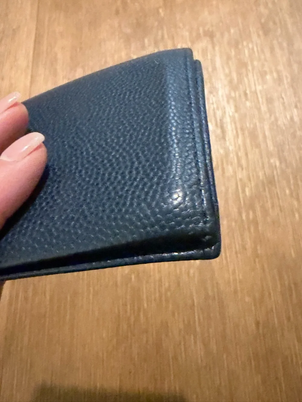 Salvatore Ferragamo men's textured leather bifold wallet with Gancini logo